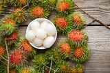 Rambutan fruit harvest from the garden rambutan tree, Fresh and ripe rambutan sweet tropical fruit peeled rambutan