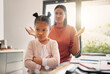 © Kay Abrahams/peopleimages.com - Upset, discipline and family while offended and stubborn little girl looking unhappy with her scolding mother in the background. Naughty, problem and bad child angry and ignoring her parent at home