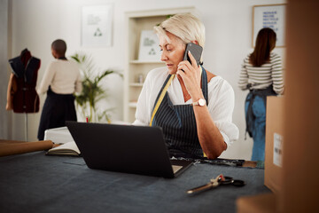 Poster - . Phone, talking and fashion design with a female designer listening to an order and making a note. Trendy, stylish and fashionable mature small business owner, entrepreneur and tailor at work.