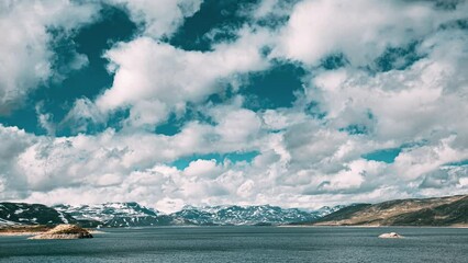 Wall Mural - Oppland, Tyin Lake, Norway. Stones On Coast Of Beautiful Lake Tyin In Summer Day. Norwegian Nature. 4K.