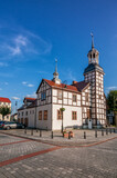 Fototapeta Miasto - Town hall with a half-timbered structure from 1697. Nowe Warpno, West Pomeranian Voivodeship, Poland.