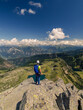 © Matteo Banfi  - Climber standing on top of a mountain