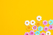 Pattern Of Wooden Colored Flowers On Yellow Background
