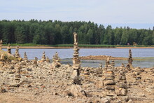 Pyramids Of Stones On The River Daugava