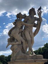 Beautiful Sculpture With Man, Woman, Pigeon, Palace, Isle Pałac Łazienkowski, Łazienki Park, Royal Baths Park, Warsaw, Poland. Most Popular Polish Tourist Attractions, Famous Poland Sightseeings