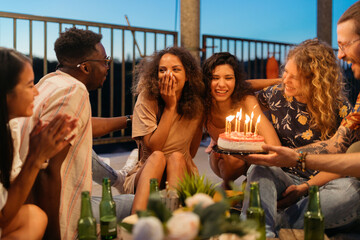 Wall Mural - A surprised girl has a birthday party on the roof.