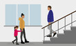 © Tatyana - A woman and a girl go to the stairs on which the man is standing