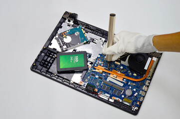Poster - top view while mechanic repairing Motherboard (hard disk, SSD)
