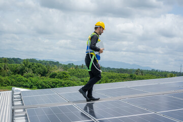 Poster - Engineers checking the operation of the system solar cell on roof at factory,Alternative energy to conserve the world's energy,Photovoltaic module idea for clean energy production.