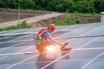 Aufkleber - Engineer wearing safety harness belt during working on replacement solar panel in solar power plant,Ecological.
