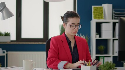 Poster - business woman working on project with marketing statistics in startup office. sales assistant plann