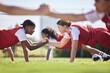 © Alexis Scholtz/peopleimages.com - Women soccer, football or team sports holding hands in unity, support or motivation in routine workout, exercise or training drill. Diverse group of fit, active or healthy athletes and girls on field