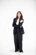 © todja - Asian businessman and businesswoman colleagues at work, Happy colleagues work together in office on white background.