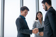 © todja - Teamwork Deal Cooperation Partnership business people shaking hands, Shaking hands of two business people in the office.