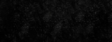 Dark Black Grunge Textured Concrete Background. Panorama Dark Grey Black Slate Background. Dark Grunge Textured Wall Closeup Background. Old Black Background. Blackboard. Chalkboard Texture.