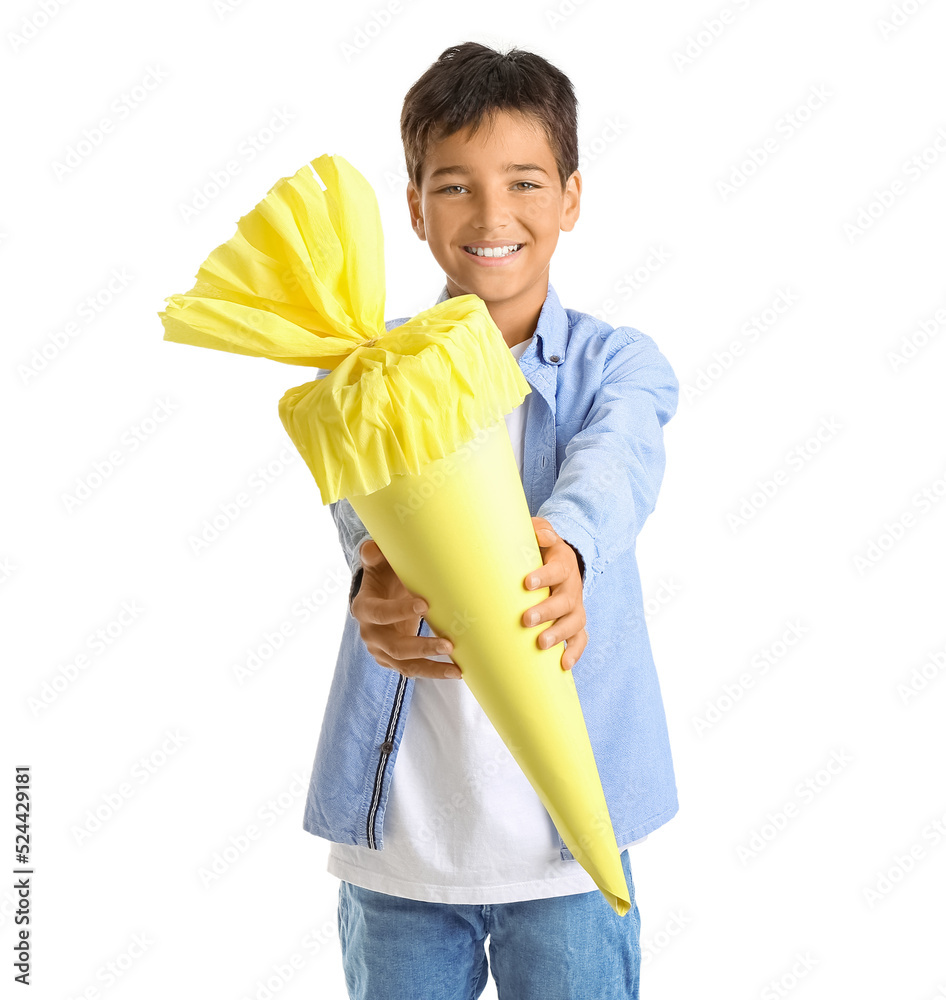 Little boy with yellow school cone on white background