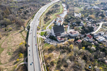 Wall Mural - Trasa Siekierkowska route and Siekierki Sanctuary of Our Lady in Warsaw, Poland