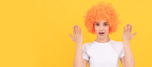 Surprised Freaky Woman In Curly Clown Wig With Raised Hands, Surprise. Woman Isolated Face Portrait, Banner With Copy Space.
