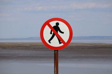 Road sign Pedestrian traffic is prohibited. No entry, no humans allowed sign. Man silhouette in crossed out red circle.