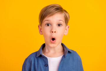 Portrait of astonished person open mouth stupor confused cant believe isolated on yellow color background