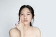 © Nitcharee - Asian Beautiful  woman with clean fresh skin, Face care, Facial treatment, Cosmetology, beauty and spa.