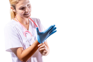 Young girl doctor putting on blue gloves for surgery at white background