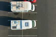 Aerial View Of Camper Vans Parked On Parking Lot