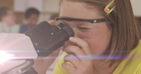 Poster - Animation of light trails over caucasian schoolgirl using microscope