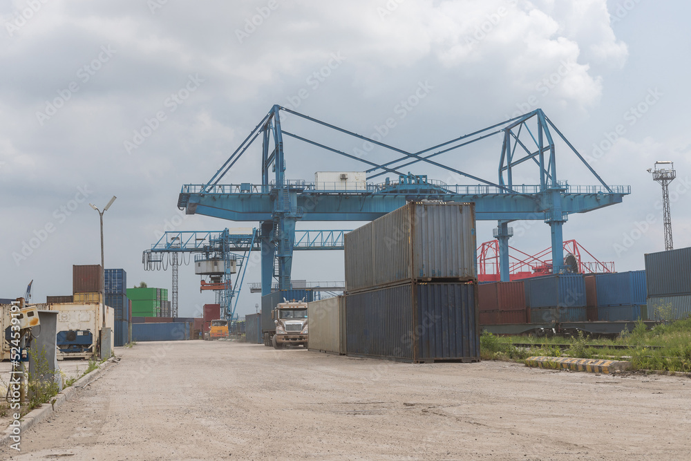 Container loading in a Cargo freight ship with industrial crane ...