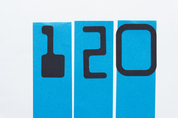 Sticker - MICR font number 120 on blue and white paper