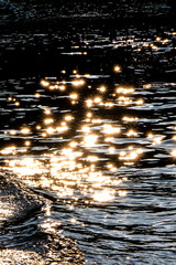 Wall Mural - sunlight glitters on river water surface