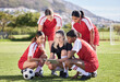 © Alexis Scholtz/peopleimages.com - Soccer, sports and woman athlete players planning, discussing and briefing game plan by coach on digital tablet. Teamwork, training and speaking female footballers at stadium field with goal posts
