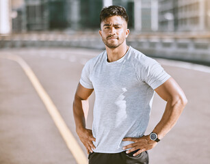 Poster - Fitness, sports and runner with motivation, wellness goals and vision in city, town or dowtown. Portrait of active, athletic or healthy man on street for routine running workout, exercise or training