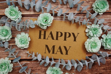 Poster - Happy May typography text on paper card decorate with flower on wooden background