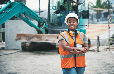 Canvas Print - Happy woman construction worker with a ready to work smile on a job site outside. Portrait of a proud young building development manager about to start working on engineering industrial plans