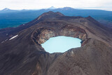 Fototapeta Desenie - Volcano Maly Semyachik with an acid lake in the crater. Kamchatka, Russia.