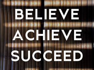 Wall Mural - Inspirational and Motivational Concept. BELIEVE ACHIEVE SUCCEED text background. Stock photo.