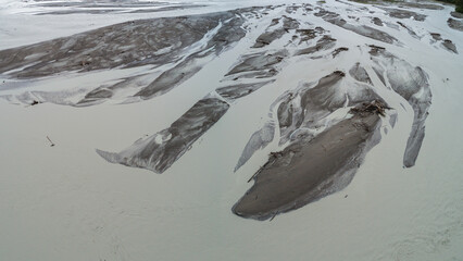 Aerial view over a braided muddy glacial river, Yukon Territory, Canada