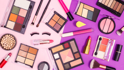 Wall Mural - Make up products pattern on pink and purple background. Flat lay