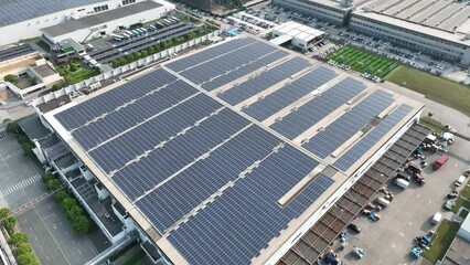 Wall Mural - solar panels on factory rooftop