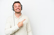 © luismolinero - Telemarketer caucasian man working with a headset isolated on white background pointing to the side to present a product