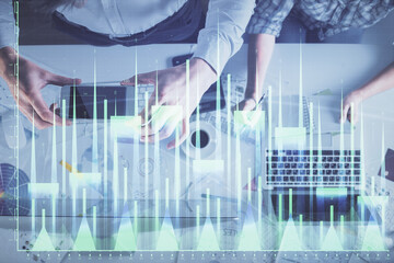 Poster - Double exposure of man and woman working together and financial chart hologram drawing. market analysis concept. Computer background. Top View.
