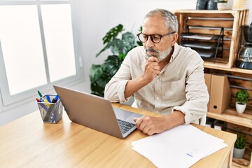 Wall Mural - Senior grey-haired man stressed working at office