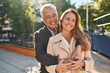 © Krakenimages.com - Middle age man and woman couple hugging each other standing at park