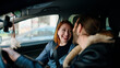 © Krakenimages.com - Man and woman couple smiling confident driving car at street