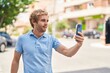© Krakenimages.com - Young man smiling confident making selfie by the smartphone at street