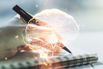 Poster - Creative artificial Intelligence concept with human brain hologram and woman hand writing in notebook on background. Multiexposure