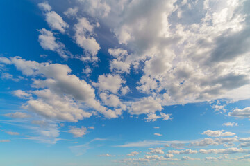 Poster - White clouds in the blue sky. Beautiful natural background.