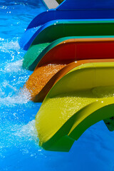 Wall Mural - Colorful slides in the water park in summer