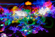 © Austockphoto - Light painting with multiple glow sticks